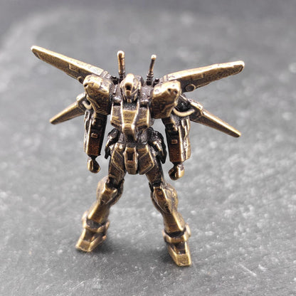 Brass Winged Mobile Suit Micro Figurine — Sci-Fi Mecha Diorama and Terrarium Sculpture