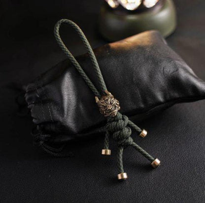 Brass Mythical Mask Paracord Keychain — EDC Backpack Charm & Car Ornament