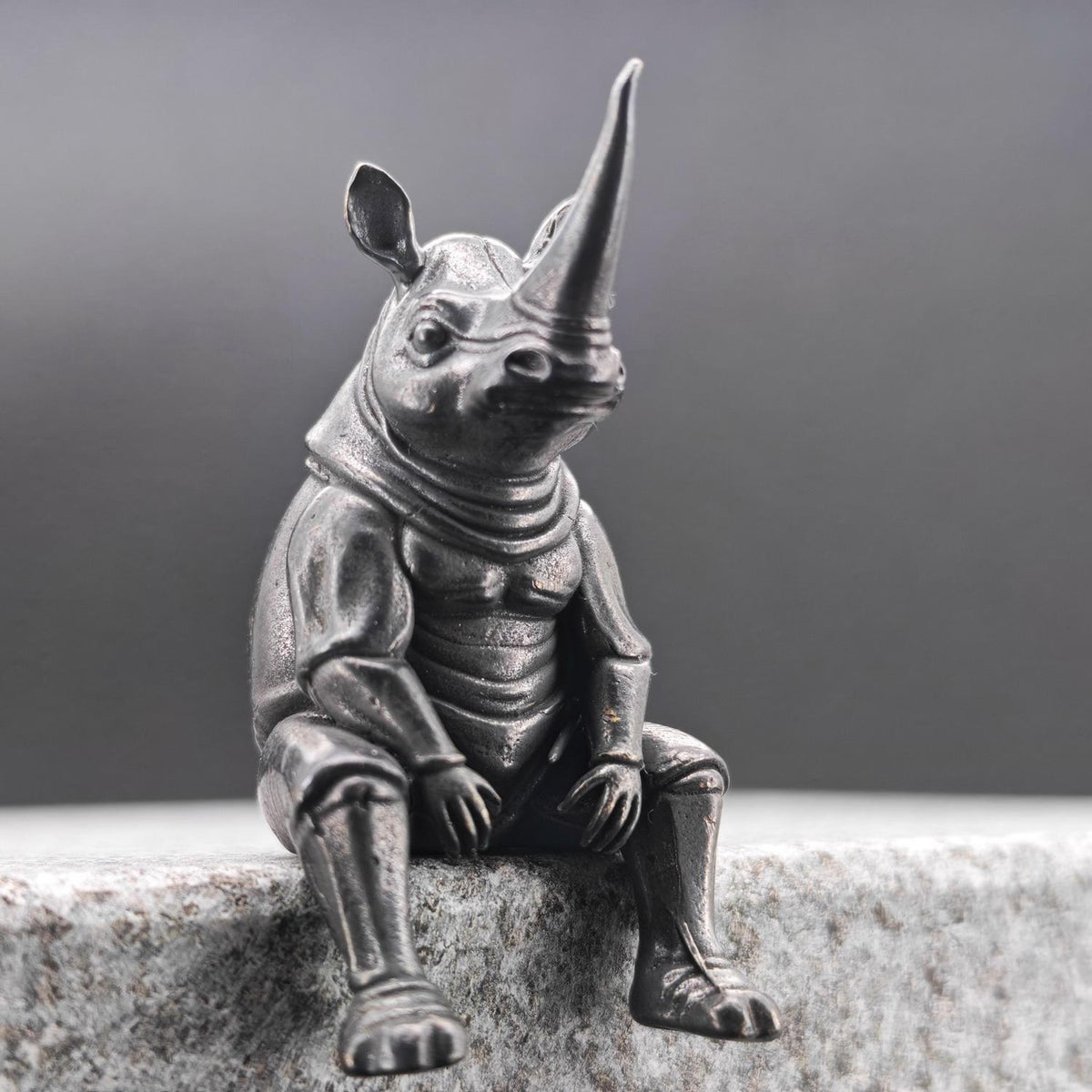 Brass Seated Rhino Figurine — Anthropomorphic Double-Horn Sculpture for Desk and Shelf