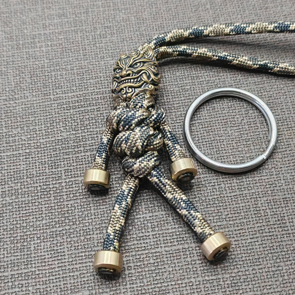 Brass Mythical Mask Paracord Keychain — EDC Backpack Charm & Car Ornament