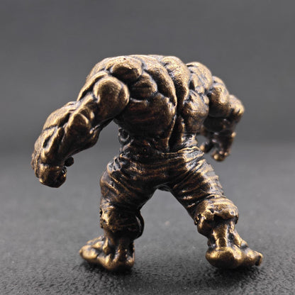Brass Muscle Monster Figurine — Man Holding a Giant Brass Sculpture & Fantasy Desk Piece