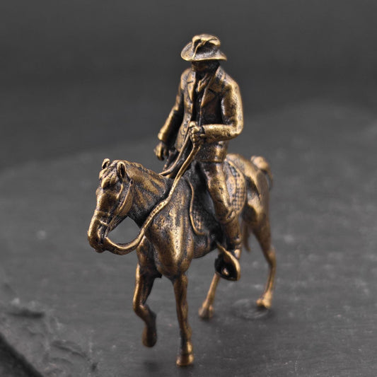 Brass Cowboy on Horseback Figurine — Polished Western Desk Sculpture & Miniature Collector Piece