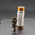 Lifted Off the Ground — Brass Kissing Couple Figurine