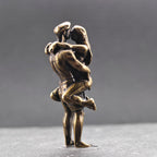 Lifted Off the Ground — Brass Kissing Couple Figurine
