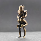 Lifted Off the Ground — Brass Kissing Couple Figurine