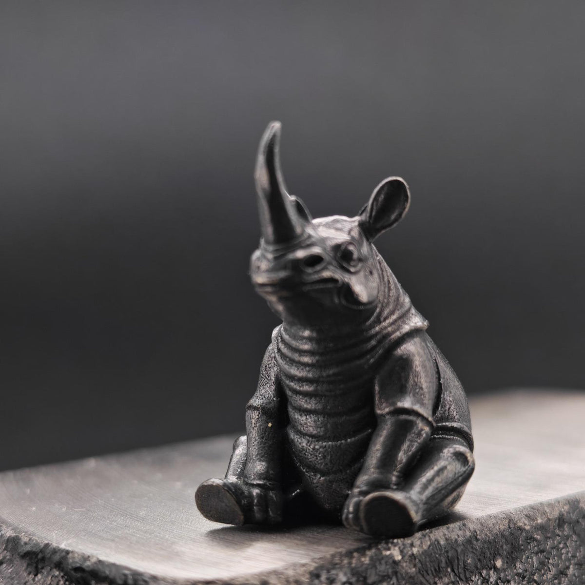 Daydreaming Rhino Brass Figurine – Meditating Animal Collectible Sculpture