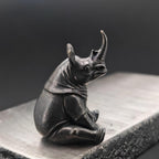 Daydreaming Rhino Brass Figurine – Meditating Animal Collectible Sculpture