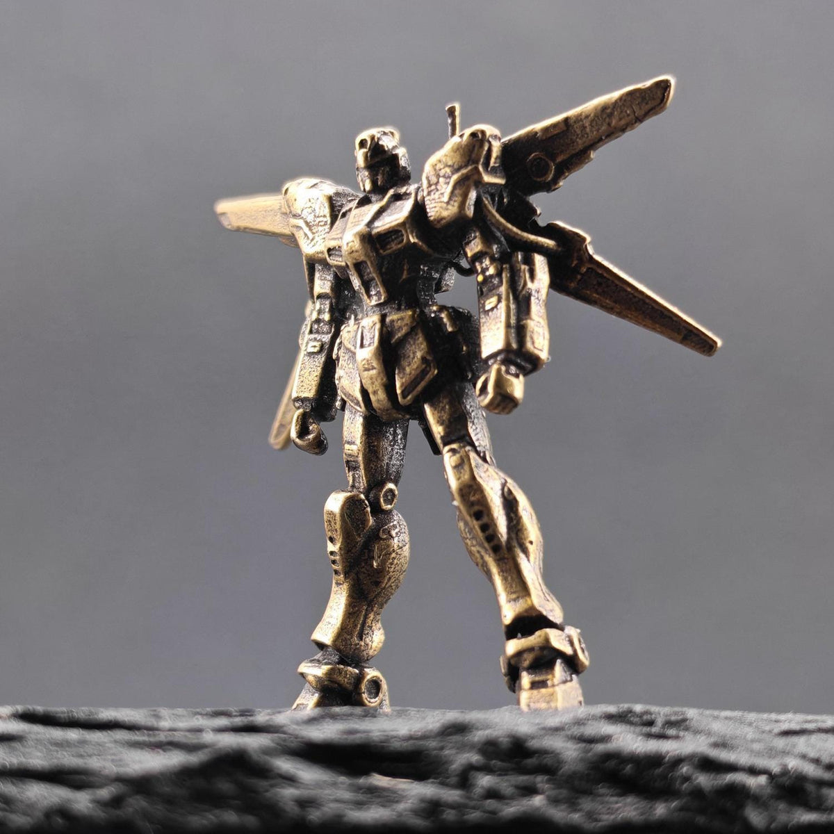 Brass Winged Mobile Suit Micro Figurine — Sci-Fi Mecha Diorama and Terrarium Sculpture