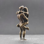 Lifted Off the Ground — Brass Kissing Couple Figurine