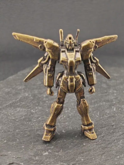 Brass Winged Mobile Suit Micro Figurine — Sci-Fi Mecha Diorama and Terrarium Sculpture