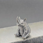 Daydreaming Rhino Brass Figurine – Meditating Animal Collectible Sculpture