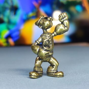 Vintage brass figurine of a sailor in a dynamic pose, crafted with fine details, A timeless collectible for maritime enthusiasts